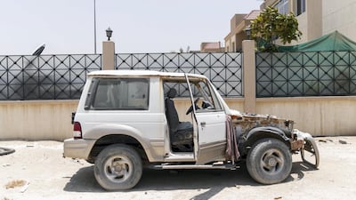 Unfinished plots have become dumping grounds for waste. Reem Mohammed / The National