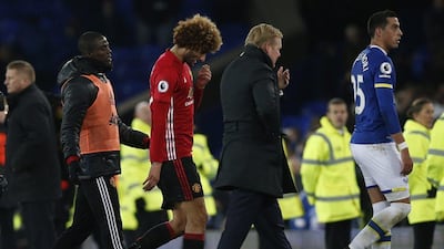 Manchester United’s Marouane Fellaini looks dejected after the game. Andrew Yates / Reuters