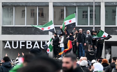 Syrians in Germany celebrating the fall of the Assad regime in December 2024, in Berlin. AFP