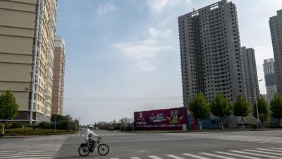 China wants private and foreign businesses to take up some of the responsibilities currently handled by state-owned companies. Zhang Peng / Getty Images