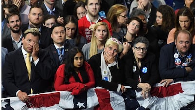 Supporter of Democratic presidential nominee Hillary Clinton react to television reports during election night at the Jacob K. Javits Convention Center in New York. Angela Weiss / AFP
