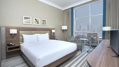 The 57-square-metre one-bedroom king suite has a lot of natural light. Courtesy Hilton Garden Inn