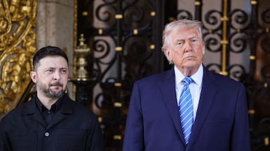 US President Donald Trump greets Ukrainian President Volodymyr Zelenskyy on December 28 in Florida. AFP