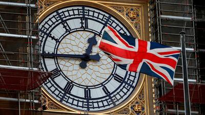 The clock face of Big Ben during ongoing renovations to the Elizabeth Tower and the Houses of Parliament. AFP