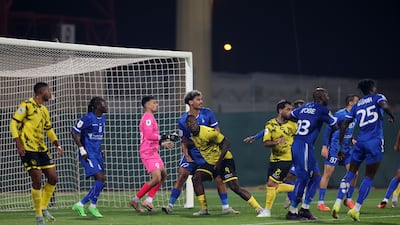 Al Ittifaq striker Mario Balotelli during a goalmouth scramble against Al Arabi.