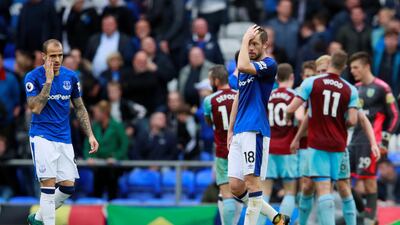 Everton's Sandro Ramirez and Gylfi Sigurdsson look dejected after their defeat to Burnley on Sunday. Jason Cairnduff / Reuters