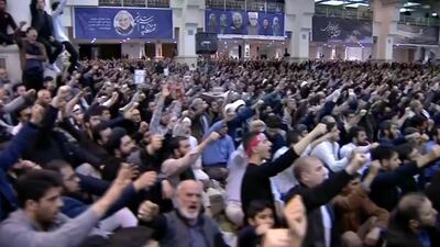 An image grab from footage obtained from the state-run Iran Press news agency shows Iranians cheering during a speech by Ayatollah Ali Khamenei on January 17, 2020. AFP