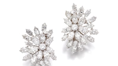 A pair of diamond ear clips, each of cluster design by David Webb, 1960s. This went for 20,160 Francs.
