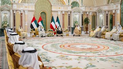 Sheikh Mohamed with Sheikh Meshal during a reception at Bayan Palace