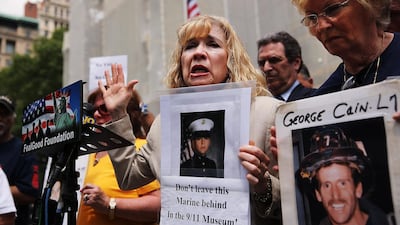 Sally Regenhard, who lost her son on 9/11, speaks at a news conference. More than 1,100 victims of the hijacked plane attacks on the World Trade Centre have yet to be identified, with a lab team working to identify the remains. Spencer Platt / Getty / AFP