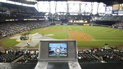 Our columnist says Seattle Mariners fans are just as comfortable buying tickets from Hiroshi Yamauchi as they games from his firm. John Froschauer / AP Photo