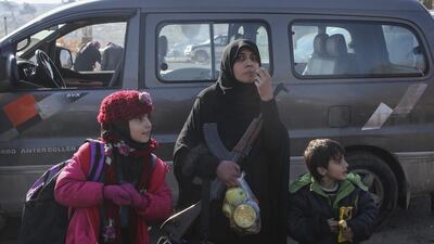 Syrians evacuated from Aleppo arrive at a refugee camp in Rashidin, near Idlib, on December 20, 2016. AP Photo