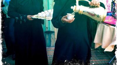 Day trip with friends to the Western Region and the Mazayin Dhafra Camel Festival, 220 kms west of Abu Dhabi on December 20, 2013.Warm greetings and traditional coffee were on hand as well. Picture taken with the Hipstamatic app for the iPhone. Liz Claus / The National