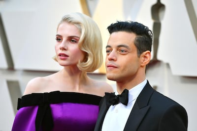 Lucy Boynton and Rami Malek arrive at the Oscars. AP