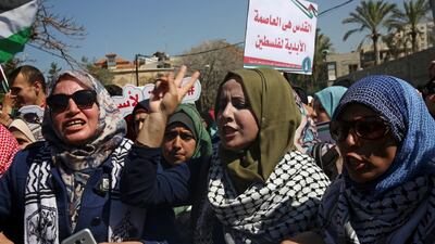 Women partake in a demonstration in front of the main office of the United Nations Special Coordinator for the Middle East Peace Process, during a rally ahead of International Women's Day, in Gaza City. AP