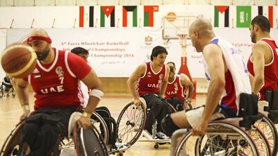 The UAE's men's wheelchair basketball team in action against Jordan at Al Ahli Sports Club in Dubai. Lee Hoagland / The National