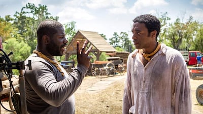 The director Steve McQueen, left, and the actor Chiwetel Ejiofor filming 12 Years A Slave. Jaap Buitendijk / courtesy Fox Searchlight / AP