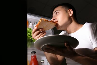 Snacking on high-quality snacks during the day may be beneficial, while late-night snacking may be harmful. Alamy