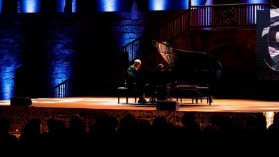 Lebanese pianist Abdel Rahman El Bacha performs during the Beiteddine International Art Festival n the historic Beiteddine Palace in Lebanon's Chouf moutains, southeast of the capital Beirut. AFP