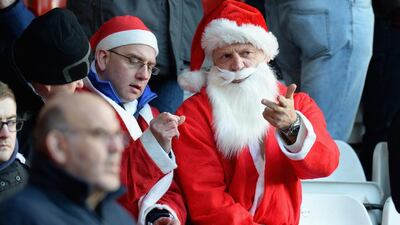 Football fans in England have embraced the flurry of fixtures that comes with the end of the year. Tony Marshall / Getty Images