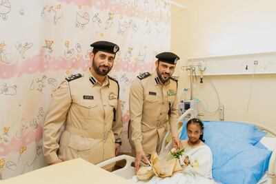 Yaqeen is visited in hospital during her recovery. Photo: Sharjah Civil Defence Authority