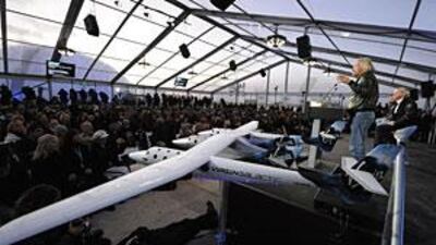 Richard Branson speaks at a news conference before Virgin Galactic's unveiling of its new commercial spaceship SpaceShipTwo in Mojave, California, last December.