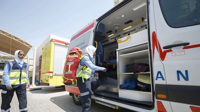 Emirati EMT's prepare an ambulance for an emergency. Ruel Pableo for The National