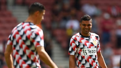 Manchester United's Cristiano Ronaldo and Casemiro warm up on Saturday. Reuters