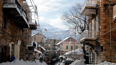 A snow-covered street in the village of Hasroun in the Lebanese mountains north of Beirut. AFP