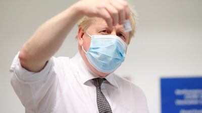 On Thursday Boris Johnson visited a vaccine centre in Northampton. Mr Johnson said this week that ministers hoped to 'ride out' the latest wave without the need for further restrictions in England. Getty Images