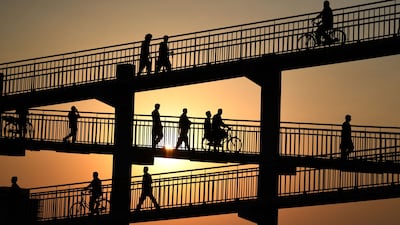 A pedestrian bridge in Dubai. Small businesses in the UAE need to seek new opportunities amid disruptions. AFP