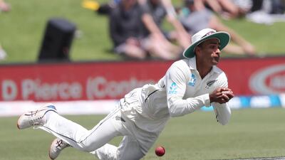 New Zealand’s Jeet Raval drops a shot from England batsman Jos Buttler. AFP