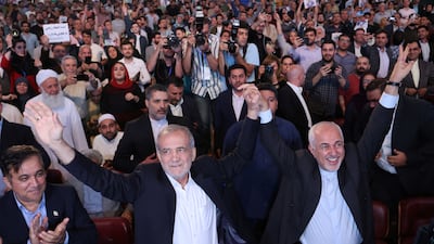 Iranian President Masoud Pezeshkian, left, and Mohammad Javad Zarif at an election campaign event in Tehran. Reuters