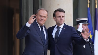 French President Emmanuel Macron, right, and Polish Prime Minister Donald Tusk at the Elysee Palace in Paris, on February 17. Bloomberg
