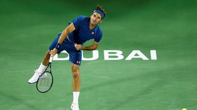 Roger Federer serves to Philipp Kohlschreiber. EPA