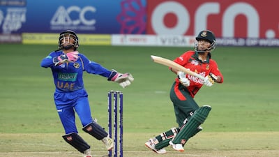 Rabeya Khan, right, plays a shot during Bangladesh's innings.