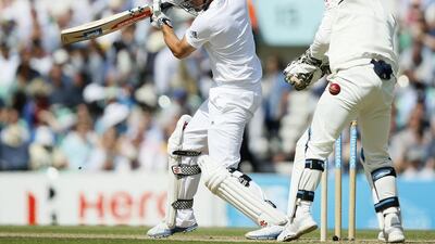Alastair Cook, left, survived two catch attempts at first slip, when he was on 65 and 70. Alastair Grant / AP Photo