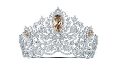 Featuring interwoven petals, leaves and vines all crafted in 18-karat gold and set with white diamonds, the highlight of the Power of Unity crown is a 62.83 carat canary diamond placed in the centre. Photo: Mouawad