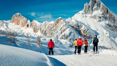 A group skis at the Tofana ski area of Cortina d'Ampezzo in the Italian Dolomites. www.bandion.it
