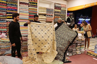 Bargaining is par for the course in certain retail hubs in the UAE, such as Global Village and Dragon Mart. Pawan Singh / The National