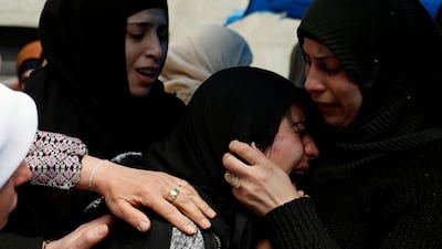 Relatives mourn during the funeral of Palestinian Mohamad Edwan near Ramallah, in the Israeli-occupied West Bank. Reuters