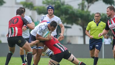 The UAE, in red and black, in action against the Philippines during their Asia Rugby Championship Division 1 clash on Saturday. Courtesy Asia Rugby / Tigers Super Sports Media