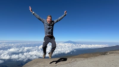 The National's Andy Mitten climbed to the top of Mount Kilimanjaro to support Manchester United's charitable foundation, which raised £120,000