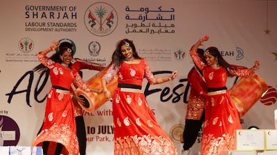 Artists performing during the Eid Al Adha festival held at Al Sajaa Labour Park in Sharjah. All photos: Pawan Singh / The National