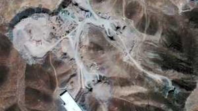 This satellite image taken last week, provided by GeoEye, shows construction of a facility inside a mountain located about 32km northeast of Qom.