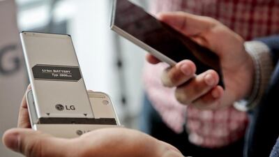 The LG G5 phone with the bottom of the phone popped out. The module contains the battery, which can be removed and inserted into a different module with extra features, such as a camera grip with physical shutter buttons. LG is dipping its toes into a modular-design concept with the G5. Bebeto Matthews / AP Photo