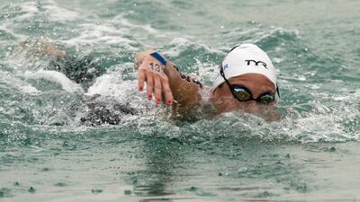Aurelie Muller of France competes on her way to winning the FINA 10km Marathon World Cup Swimming along the Corniche in Abu Dhabi on February 26, 2016. Christopher Pike / The National