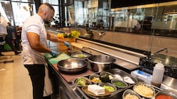 Chef Rakish of Novotel Dubai World Trade Centre prepares healthy food at the Embers restaurant. Antonie Robertson/The National