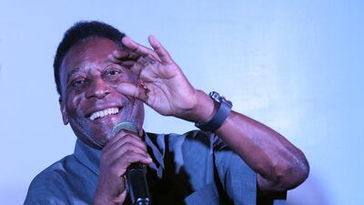 Pele speaks during a press conference in Gurgaon, a suburb of New Delhi on Thrusday ahead of his visit to the Subroto Cup final. Rajat Gupta / EPA