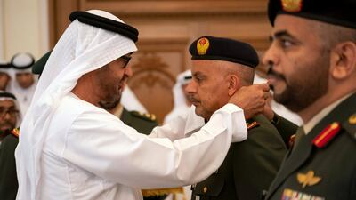Sheikh Mohamed bin Zayed presents an Emirates Military Medals to members of the UAE Armed Forces, Ministry of Interior and Abu Dhabi Police during a Sea Palace barza.